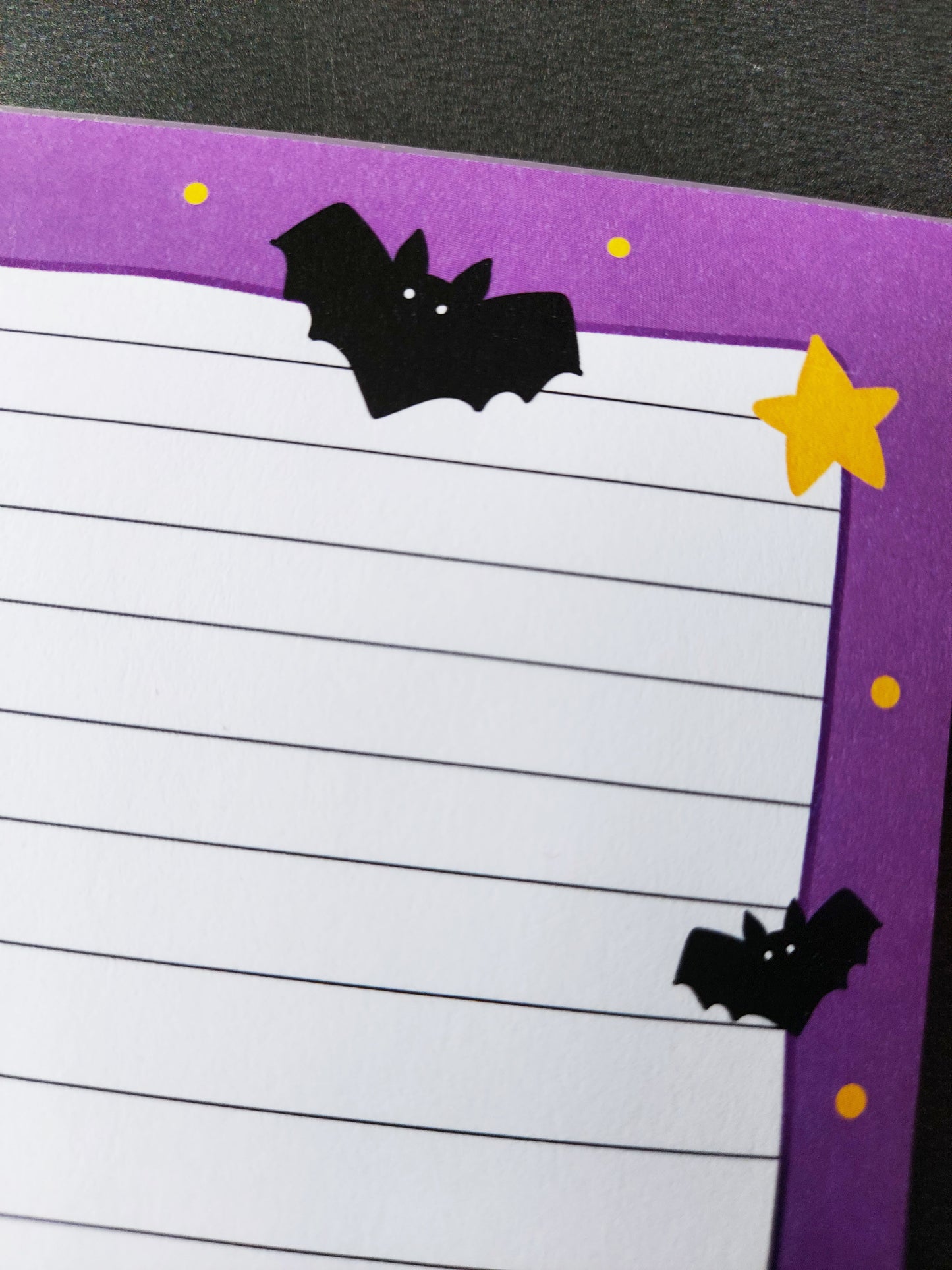 Bats Memo Pad - EmilsDoodles
An up close photo showing the details of bats and stars around the border.