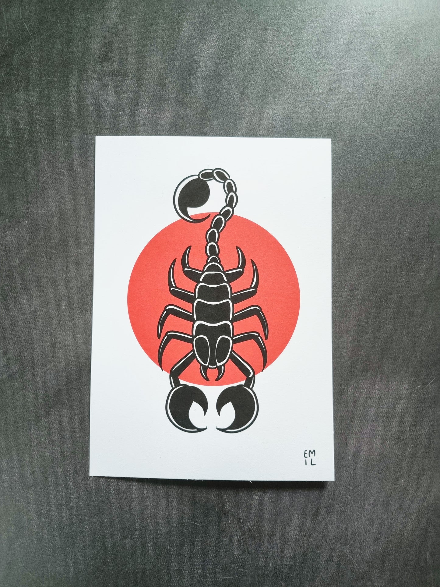 Scorpion A5 Print - EmilsDoodles
On a grey background is an art print with a scorpion design. The scorpion is on top of red circle.