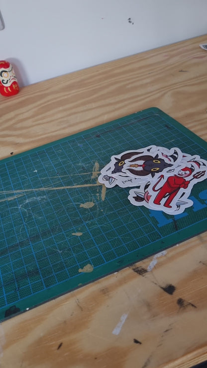 A video of someone assembling a sticker pack