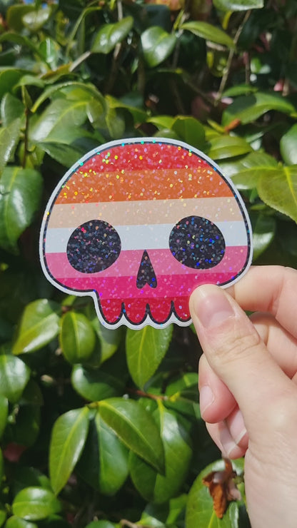 A video of the lesbian pride sticker in natural light to show the holographic sparkle.